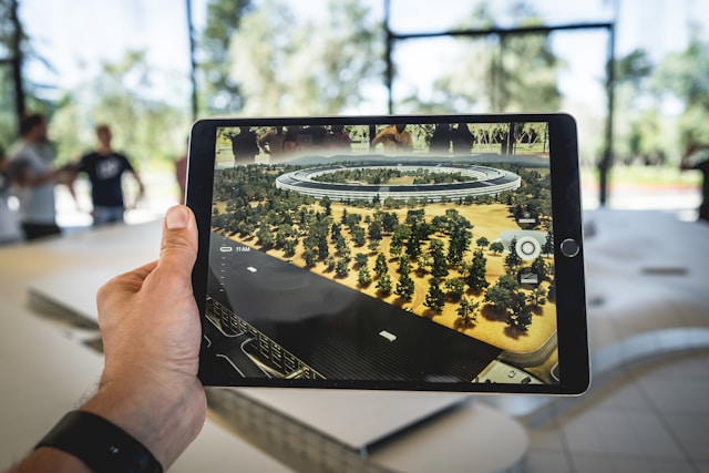 A person using AR to visualize a complete neighborhood park.